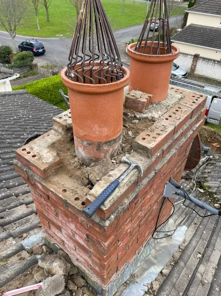chimney section chimneys rebuilt & replastered.jpeg